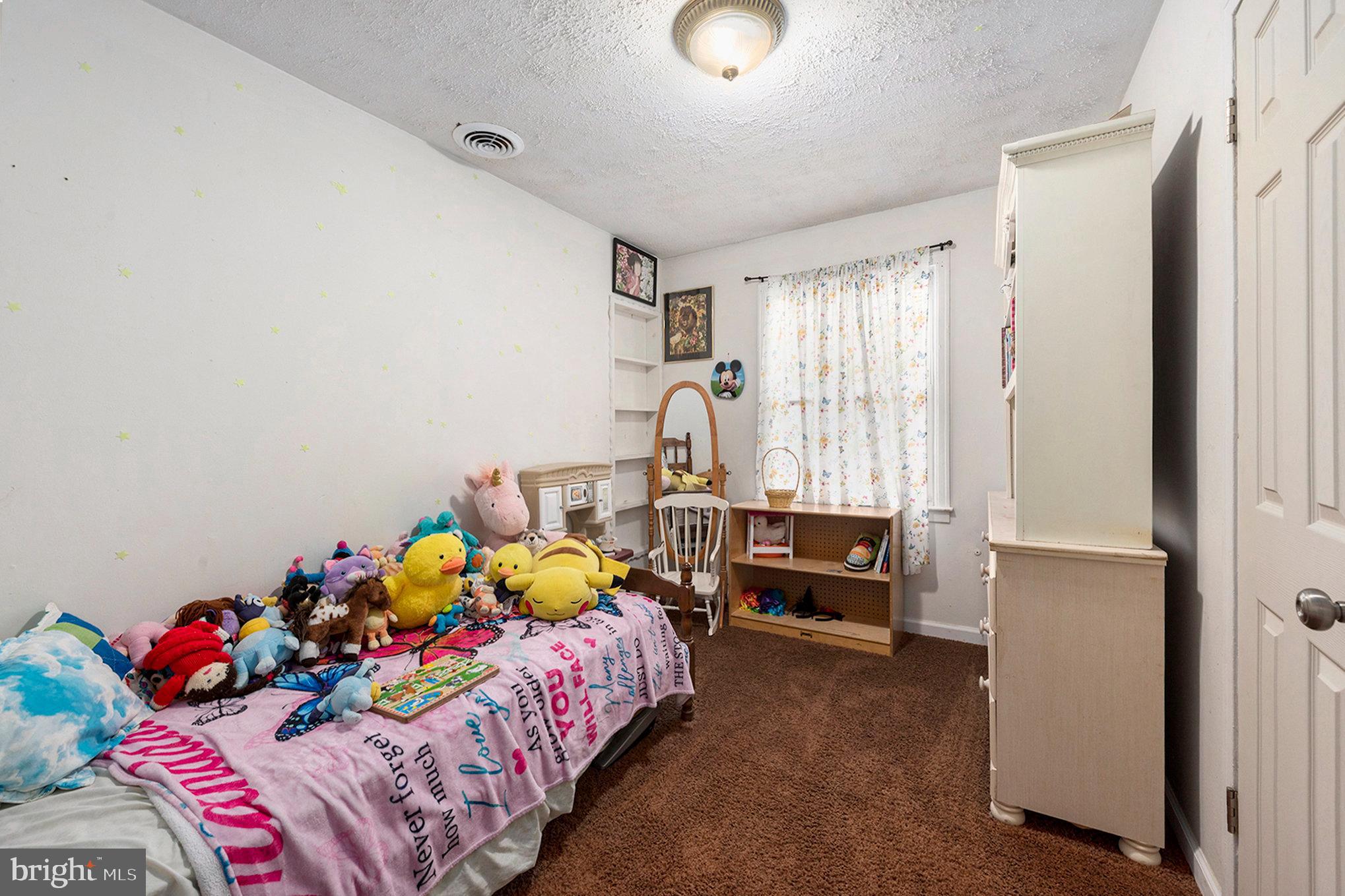 1306 Susan Avenue Croydon, PA 19021 - Photo 25 of 29 a bedroom with a bed and a window