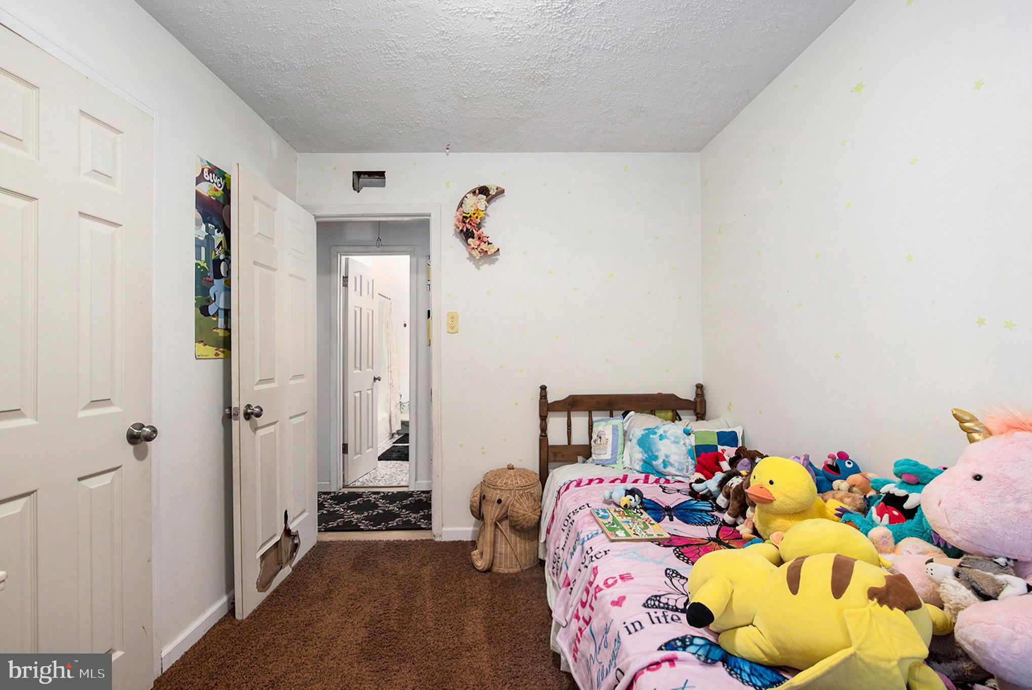 1306 Susan Avenue Croydon, PA 19021 - Photo 26 of 29 a bedroom with a bed and a dresser