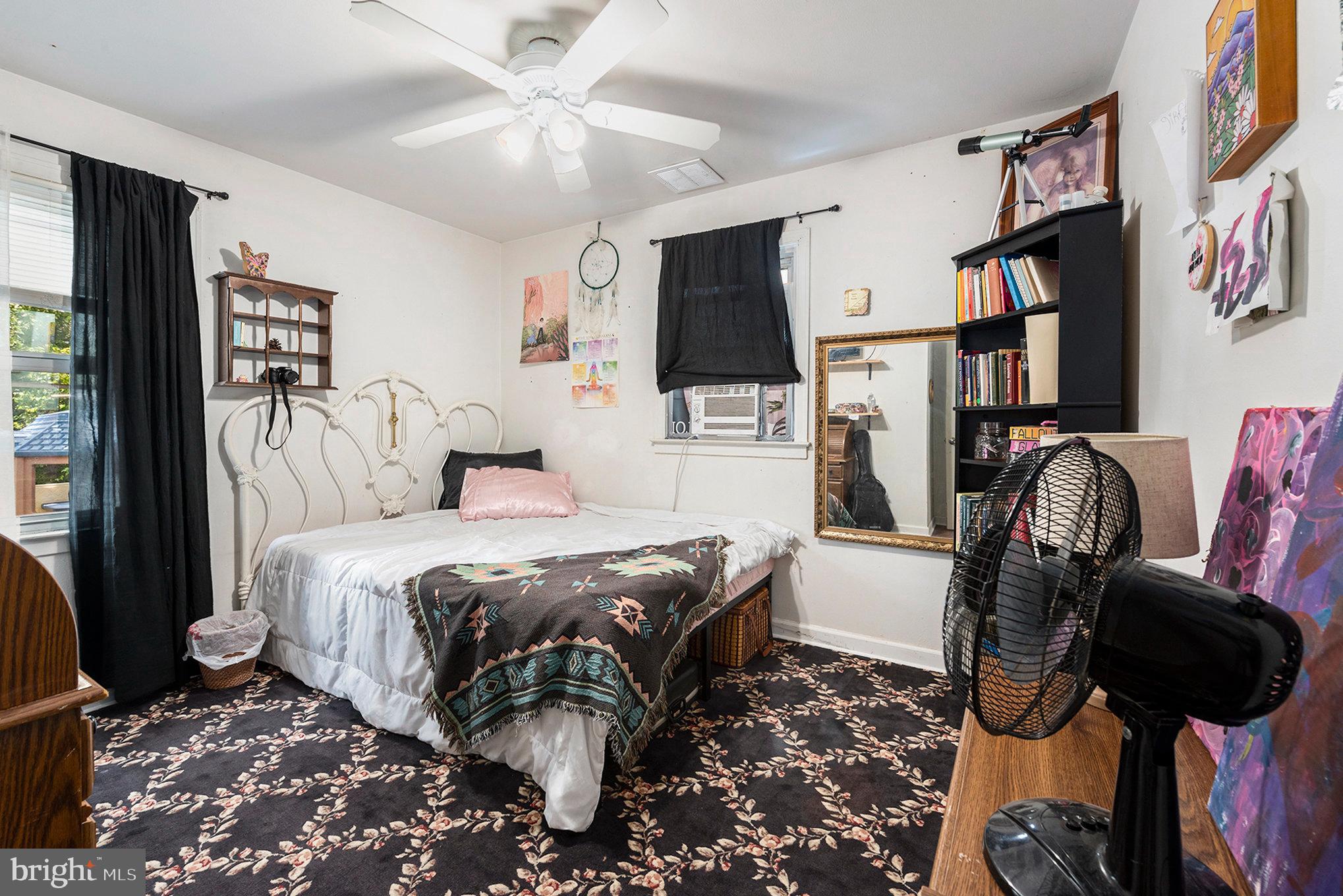 1306 Susan Avenue Croydon, PA 19021 - Photo 27 of 29 a bedroom with a bed flat screen tv and view