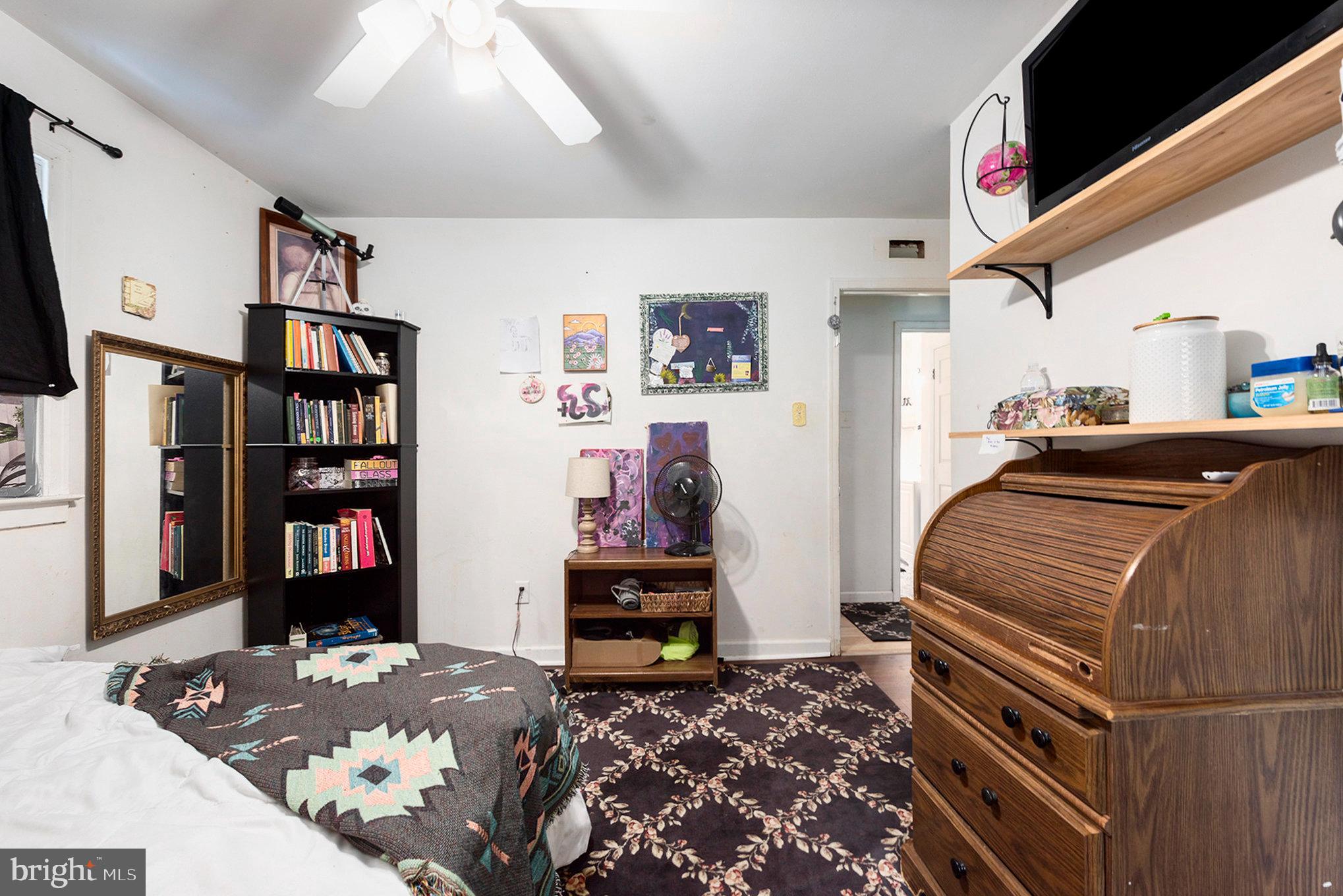 1306 Susan Avenue Croydon, PA 19021 - Photo 28 of 29 a bedroom with bed and book shelf