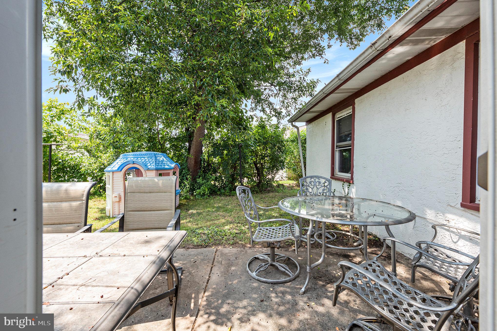 1306 Susan Avenue Croydon, PA 19021 - Photo 8 of 29 a backyard of a house with seating space