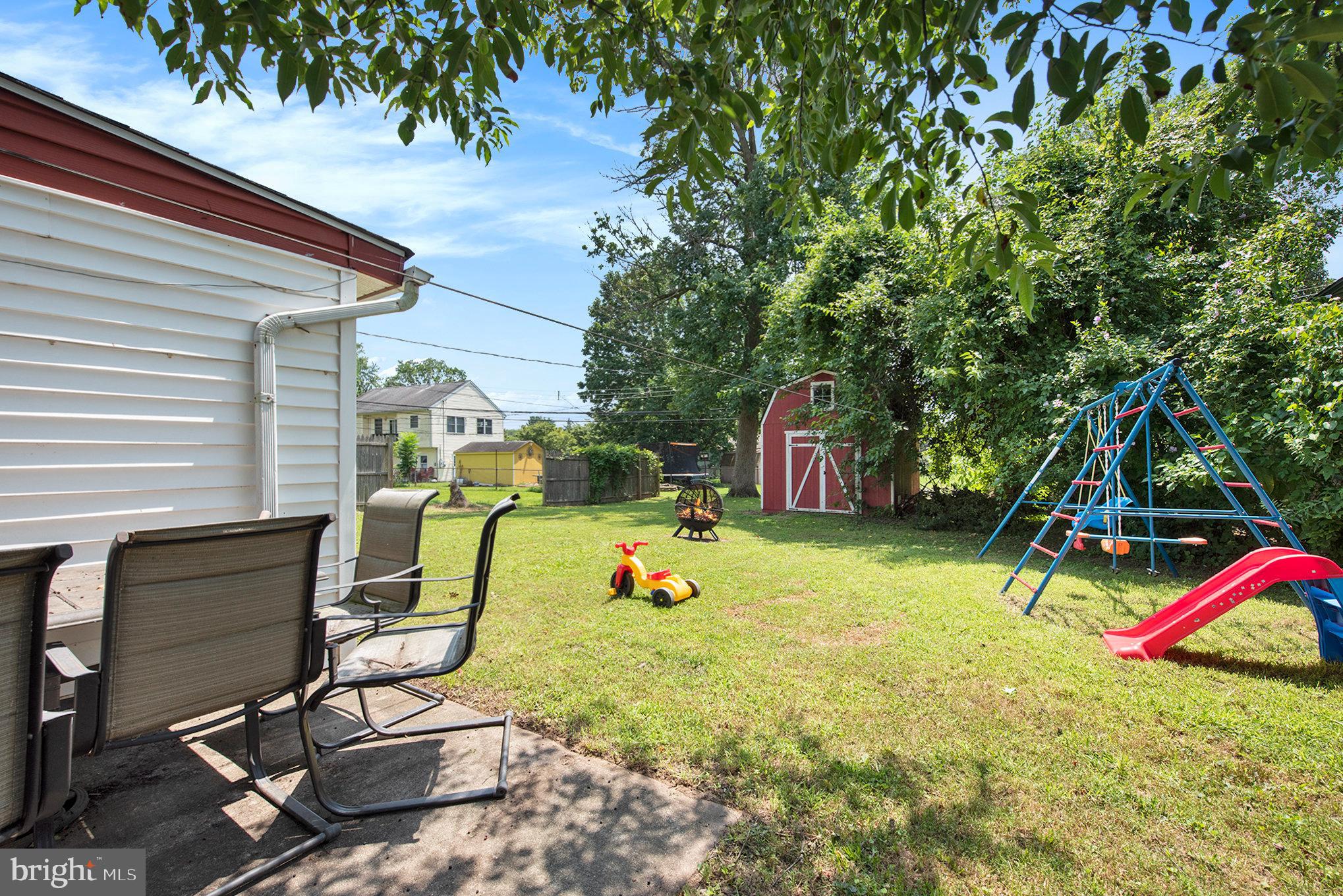1306 Susan Avenue Croydon, PA 19021 - Photo 9 of 29 a backyard of a house with table and chairs