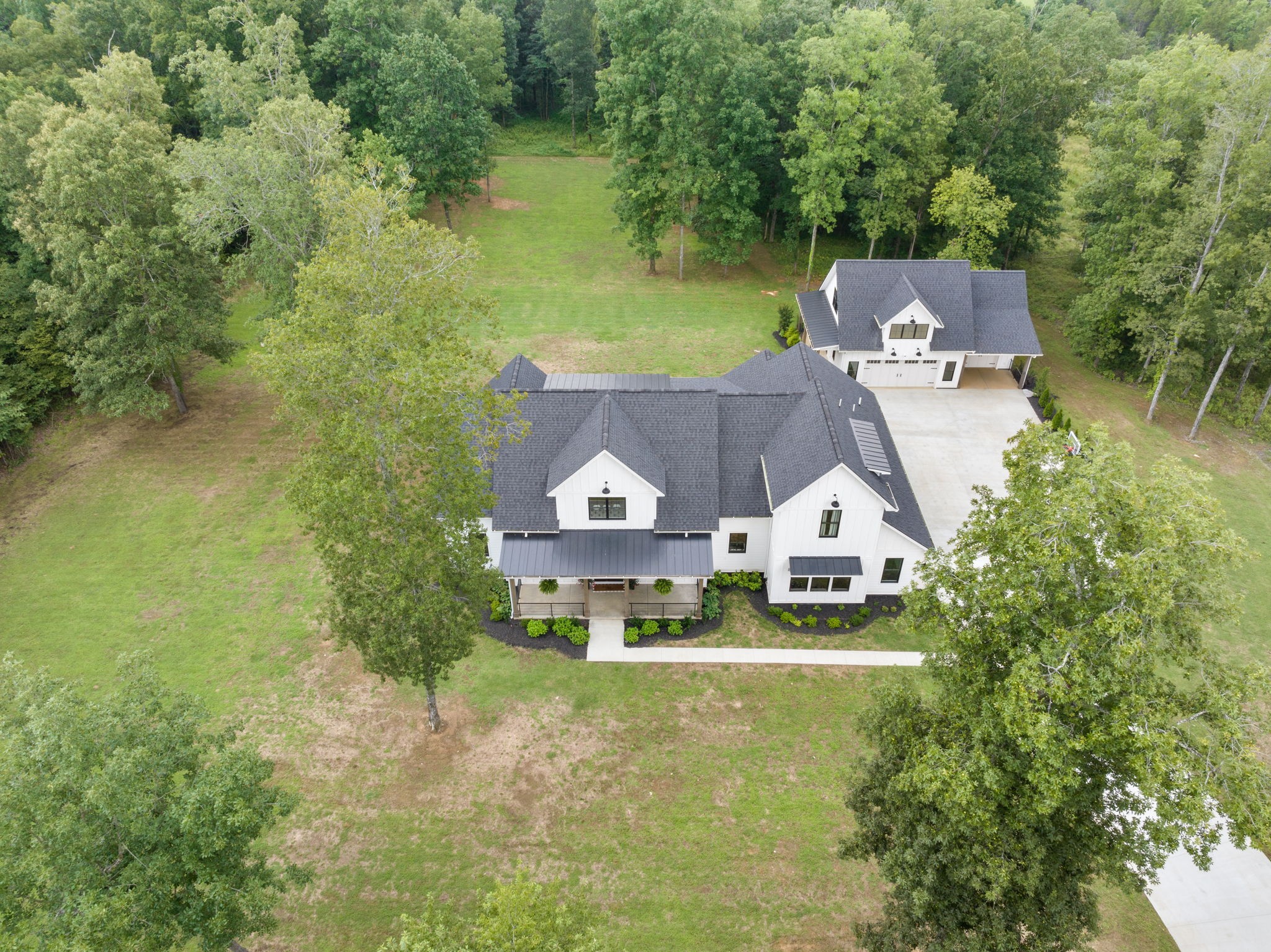 2078 Lasea Road Spring Hill, TN 37174 - Photo 3 of 58 an aerial view of house with yard and lake view