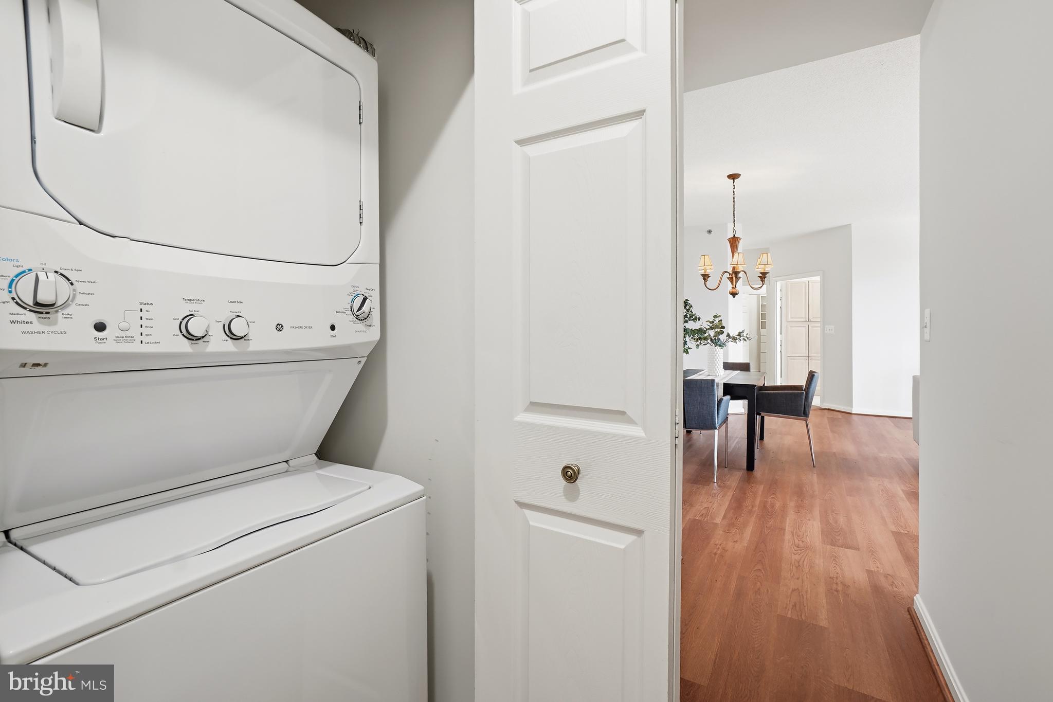 3210 North Leisure World Boulevard, Unit 1001 Silver Spring, MD 20906 - Photo 24 of 58 a utility room with dryer and washer