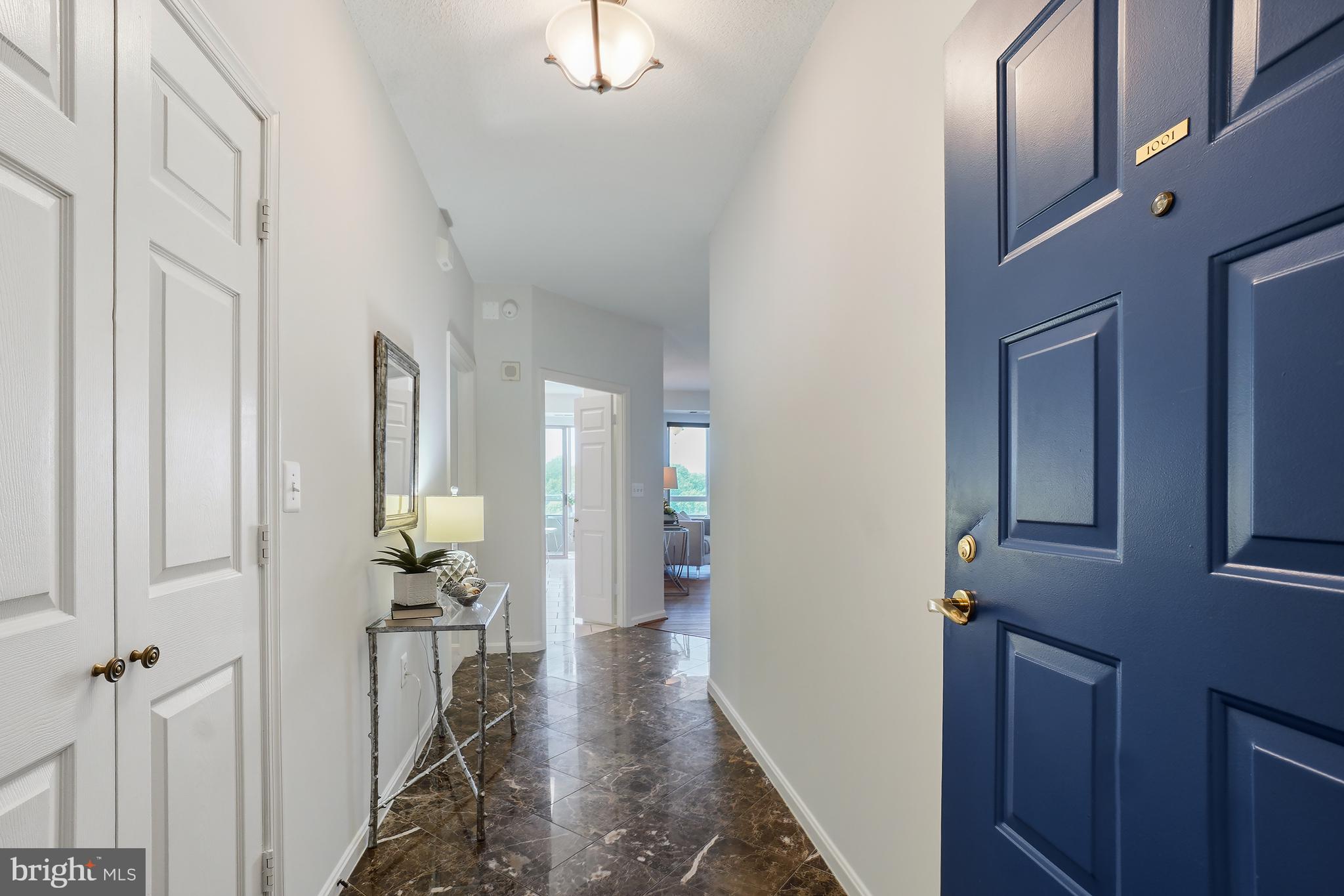 3210 North Leisure World Boulevard, Unit 1001 Silver Spring, MD 20906 - Photo 25 of 58 a view of a hallway with interior of the house