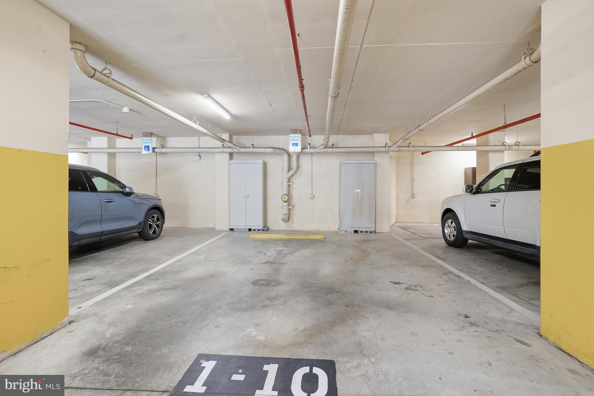 3210 North Leisure World Boulevard, Unit 1001 Silver Spring, MD 20906 - Photo 32 of 58 Over-sized parking space with 2 storage cabinets!
