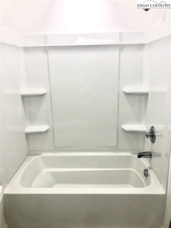 219 Hillandale Drive Boone, NC 28607 - Photo 16 of 33 a bathroom with a bathtub