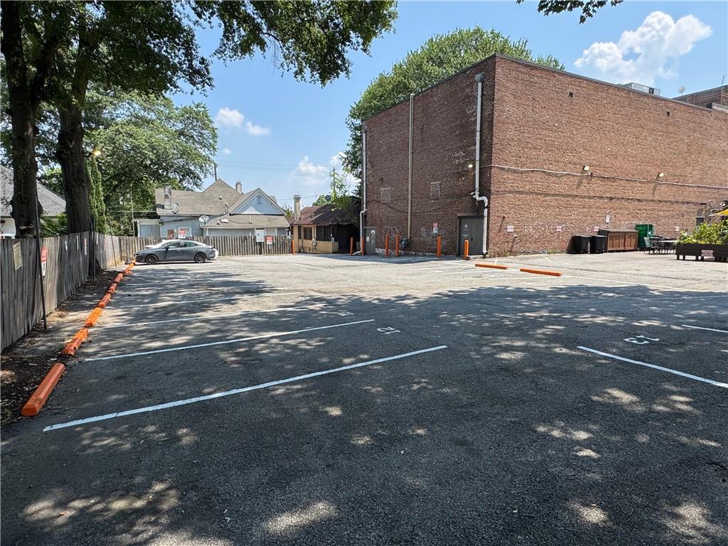 1039 Greenwood Avenue Northeast Atlanta, GA 30306 - Photo 2 of 11 a street view with residential house