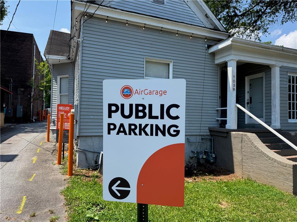 1039 Greenwood Avenue Northeast Atlanta, GA 30306 - Photo 4 of 11 a front view of a house with garden