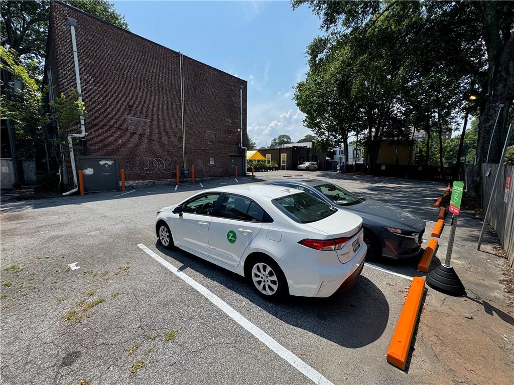 1039 Greenwood Avenue Northeast Atlanta, GA 30306 - Photo 5 of 11 a car parked in front of a house