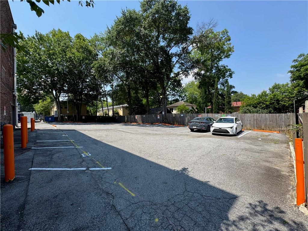 1039 Greenwood Avenue Northeast Atlanta, GA 30306 - Photo 7 of 11 a car parked on the side of the road