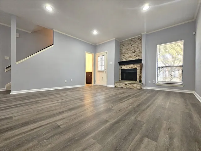 a bedroom with a bed and flat screen tv