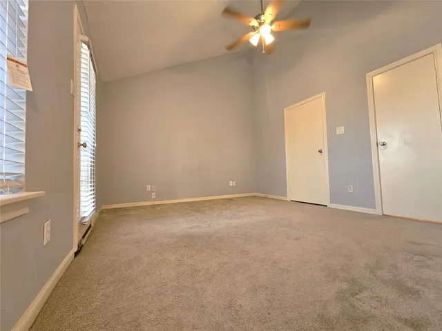 a view of a backyard with a garden and plants