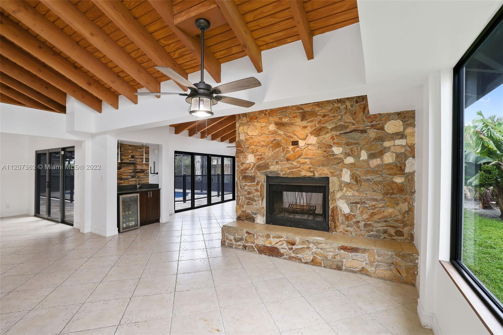 1501 Northwest 12th Terrace Boca Raton, FL 33486 - Photo 11 of 49 a view of an entryway with a fireplace