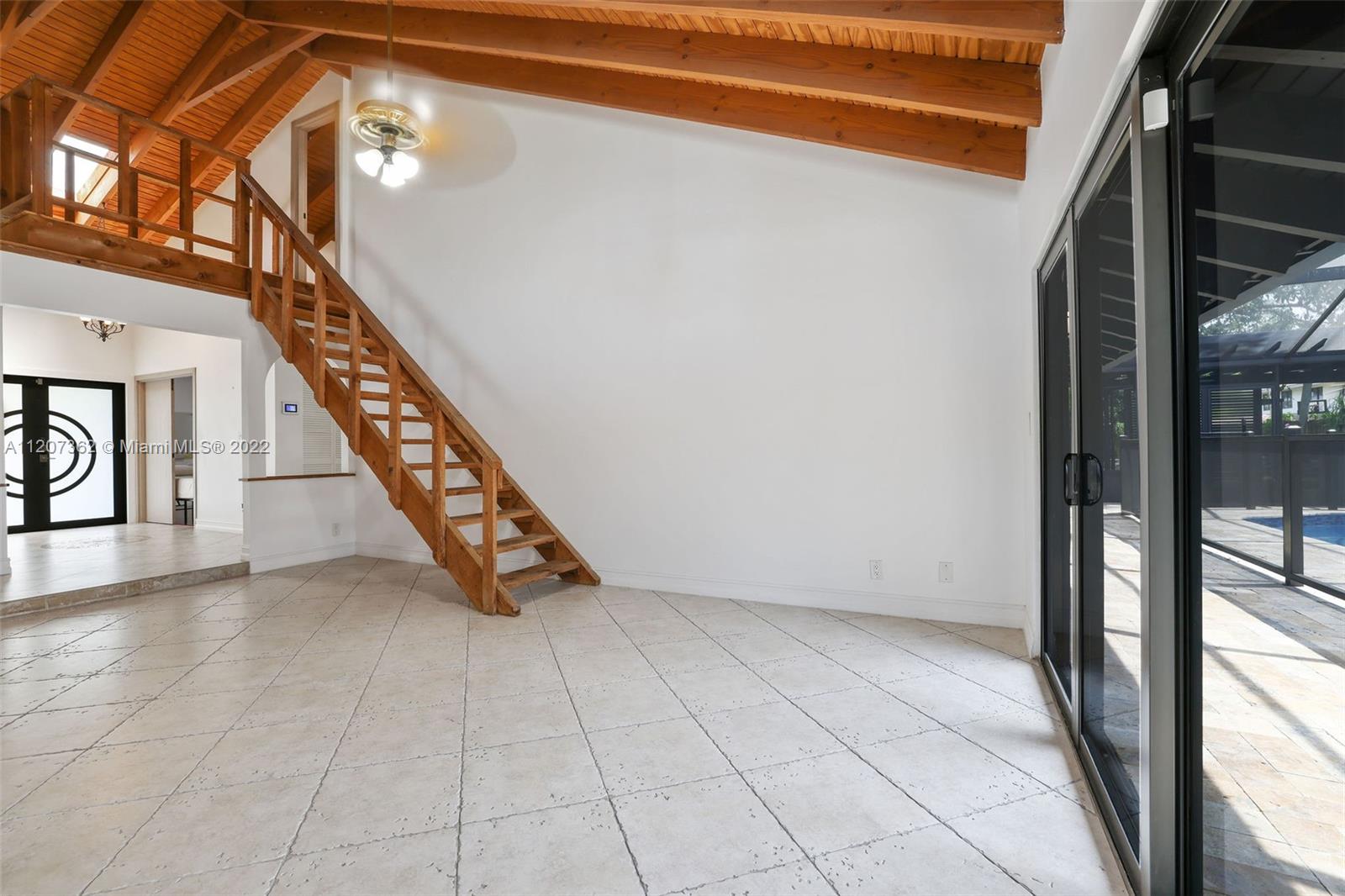 1501 Northwest 12th Terrace Boca Raton, FL 33486 - Photo 28 of 49 a view of an entryway with staircase