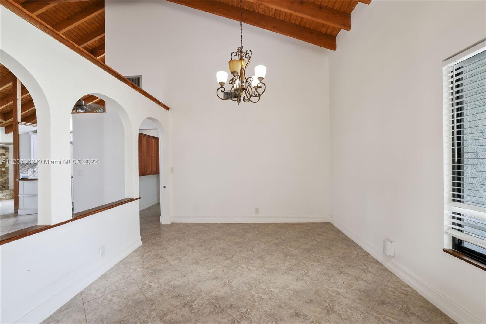 1501 Northwest 12th Terrace Boca Raton, FL 33486 - Photo 4 of 49 a view of a refrigerator in the kitchen