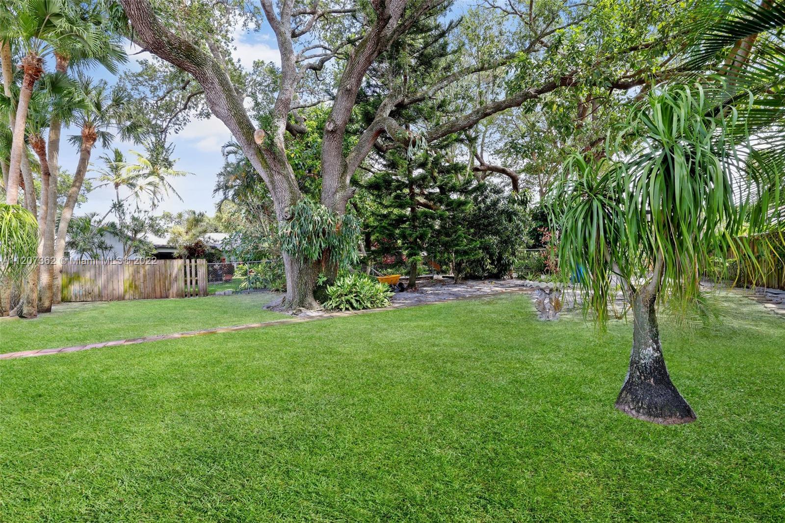 1501 Northwest 12th Terrace Boca Raton, FL 33486 - Photo 47 of 49 a view of yard with green space