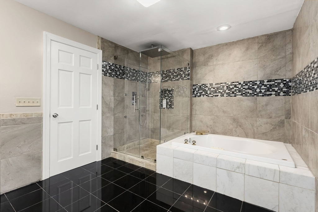 163 South Shelburne Road Greenfield, MA 01301 - Photo 19 of 36 a bathroom with a bathtub and shower