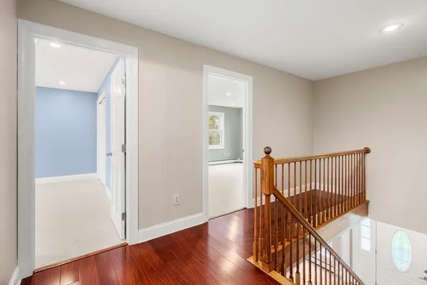 a view of entryway with wooden floor