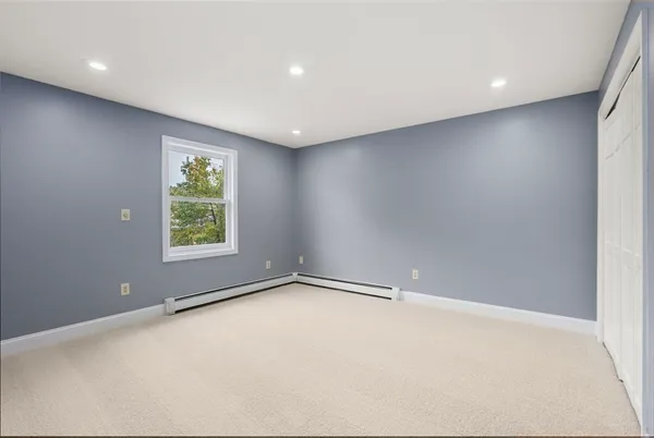 an empty room with windows
