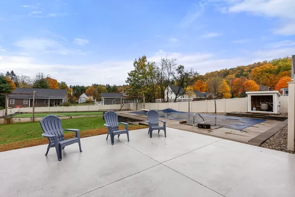 a view of a terrace with sitting area