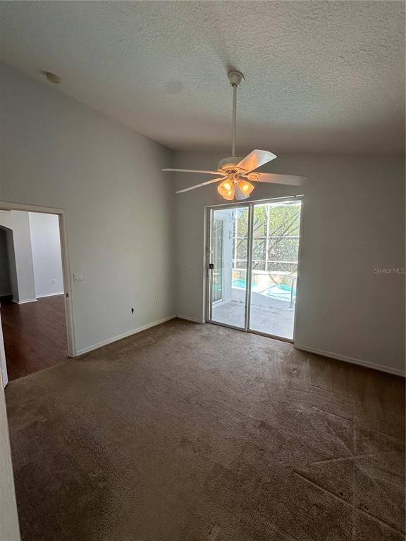 2823 Drifting Lilly Loop Kissimmee, FL 34747 - Photo 16 of 25 a view of empty room with window