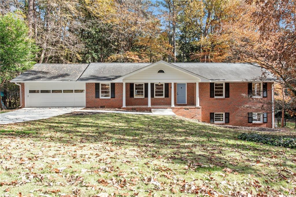 2935 Ponderosa Circle Decatur, GA 30033 - Photo 1 of 1 a front view of a house with a garden
