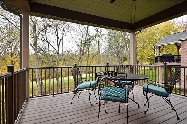 a view of a chairs on the deck