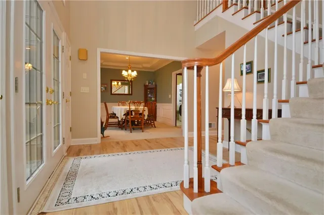 a view of a living room and entry way