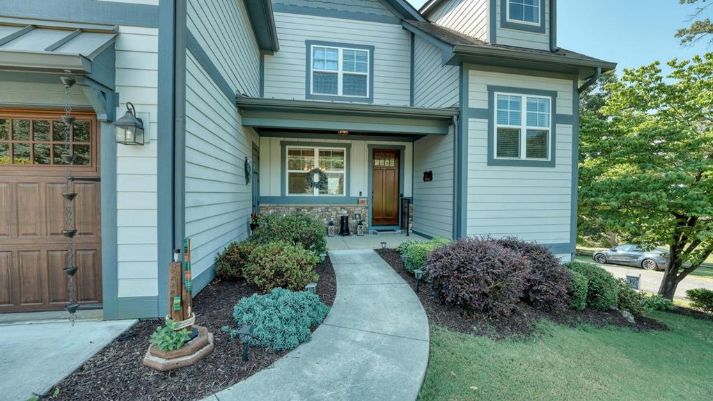 31 Elf School Road Hayesville, NC 28904 - Photo 21 of 59 a front view of a house with garden