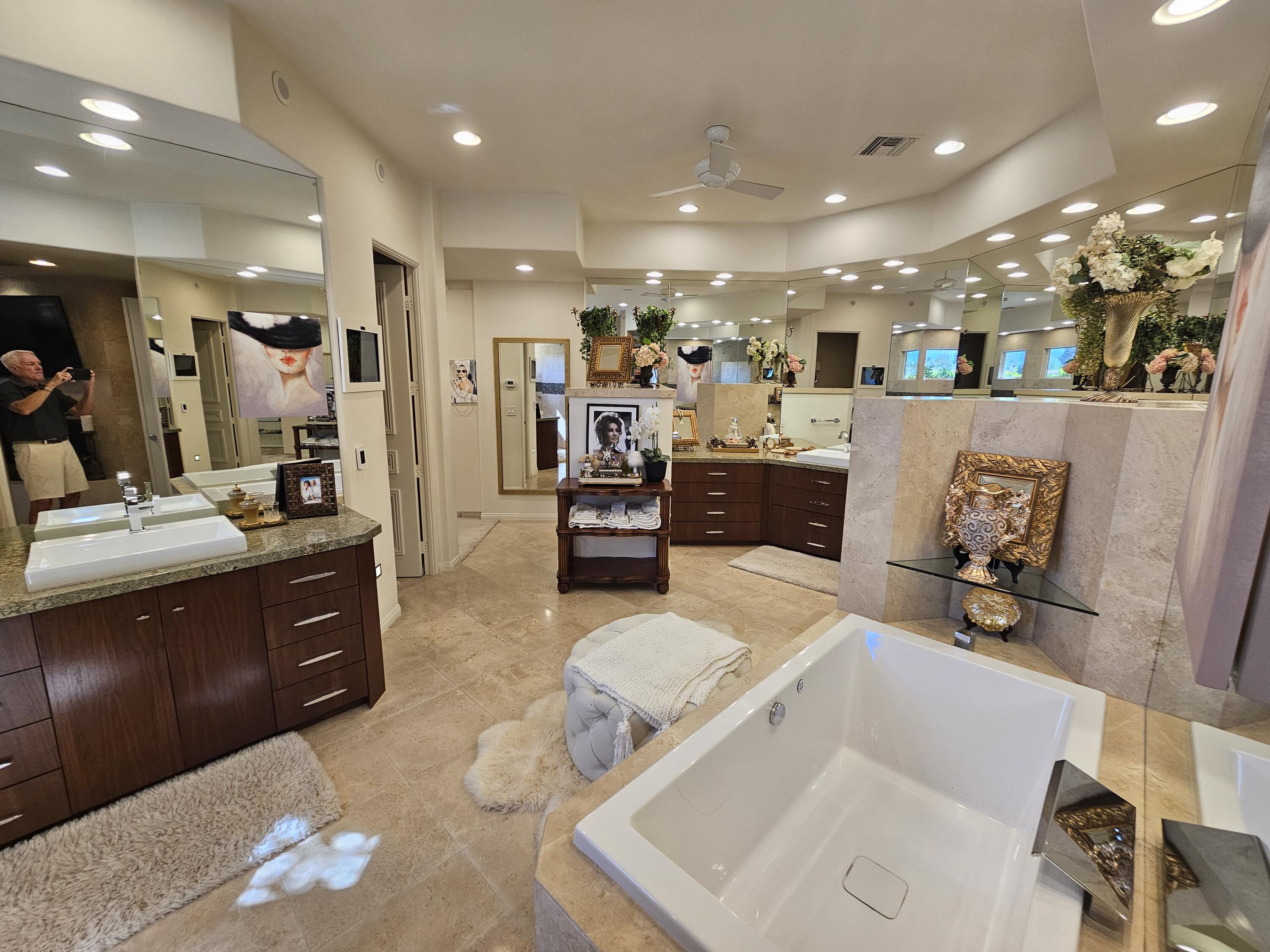 78815 Vía Carmel La Quinta, CA 92253 - Photo 19 of 74 a living room with furniture and a flat screen tv