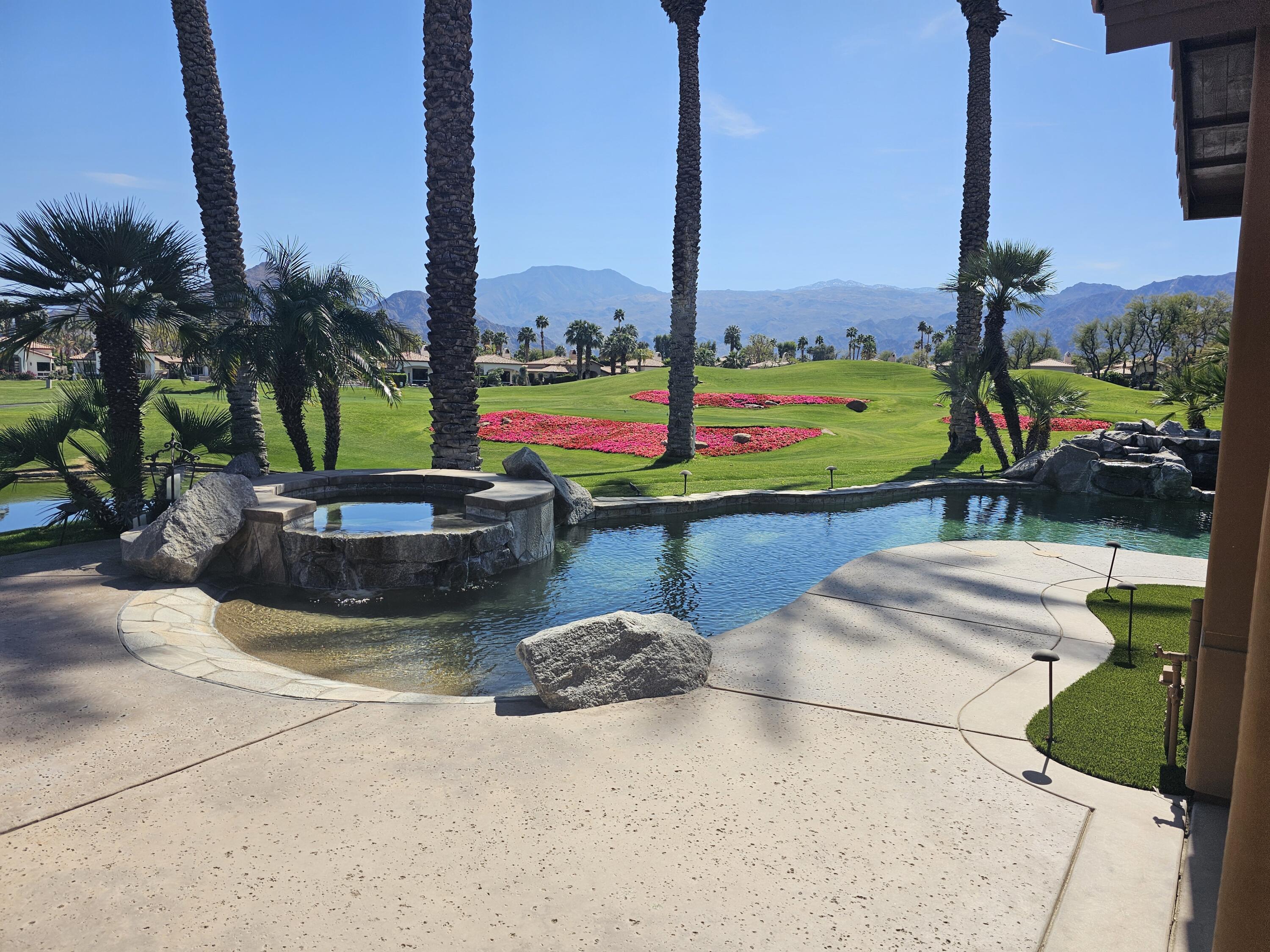 78815 Vía Carmel La Quinta, CA 92253 - Photo 36 of 74 a view of swimming pool with a table and chairs in patio