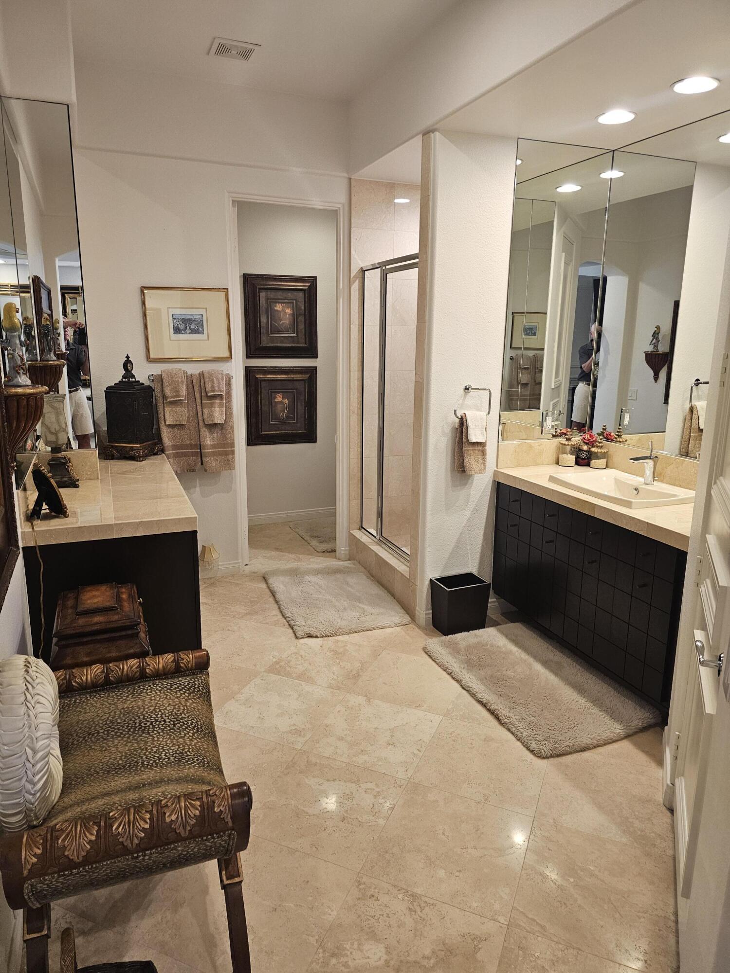 78815 Vía Carmel La Quinta, CA 92253 - Photo 38 of 74 a living room with stainless steel appliances furniture a fireplace and a flat screen tv