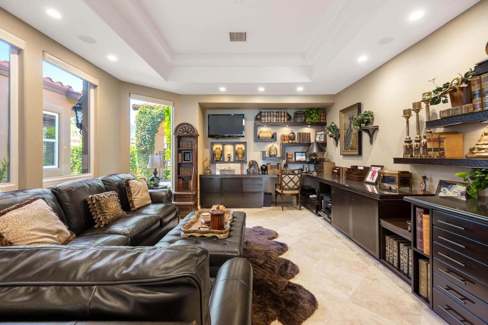 78815 Vía Carmel La Quinta, CA 92253 - Photo 45 of 74 a living room with furniture and a large window