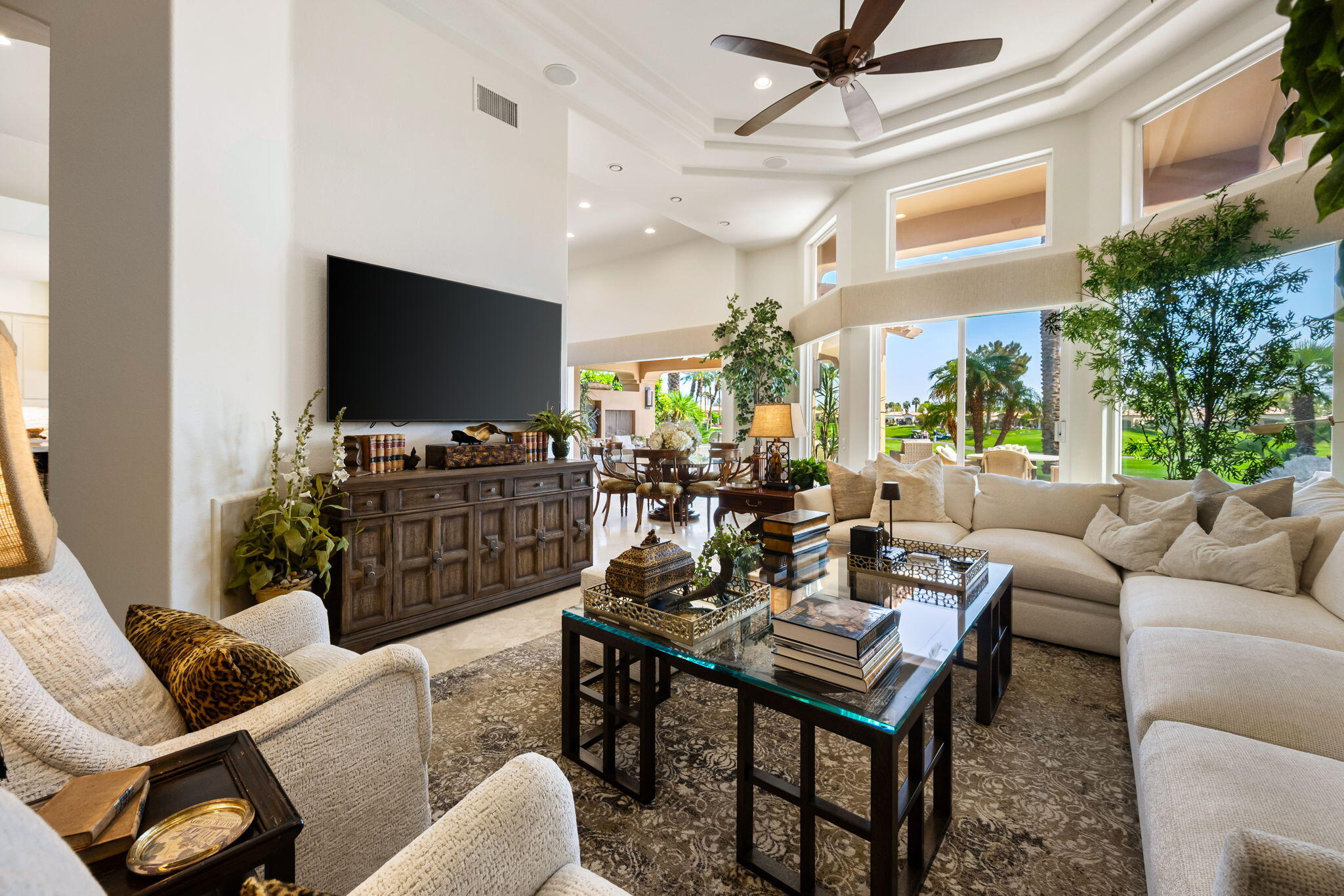 78815 Vía Carmel La Quinta, CA 92253 - Photo 50 of 74 a living room with furniture a flat screen tv and a window