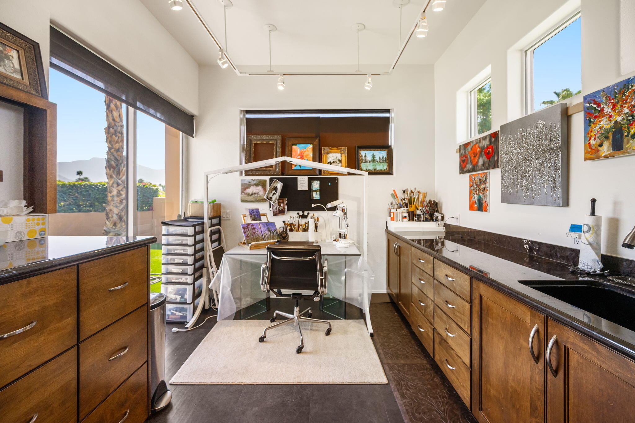 78815 Vía Carmel La Quinta, CA 92253 - Photo 60 of 74 a kitchen with stainless steel appliances a sink stove and wooden floor