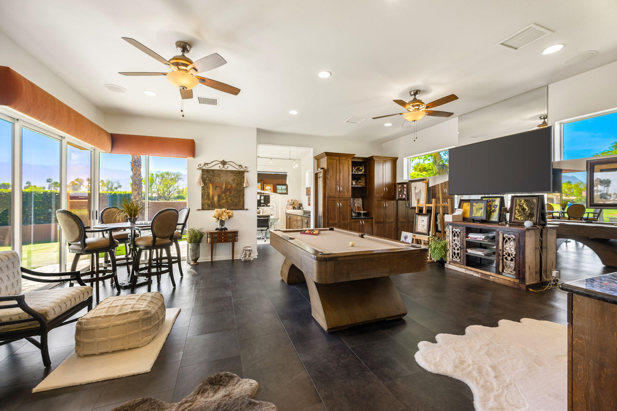 78815 Vía Carmel La Quinta, CA 92253 - Photo 62 of 74 a living room with furniture kitchen view and a large window