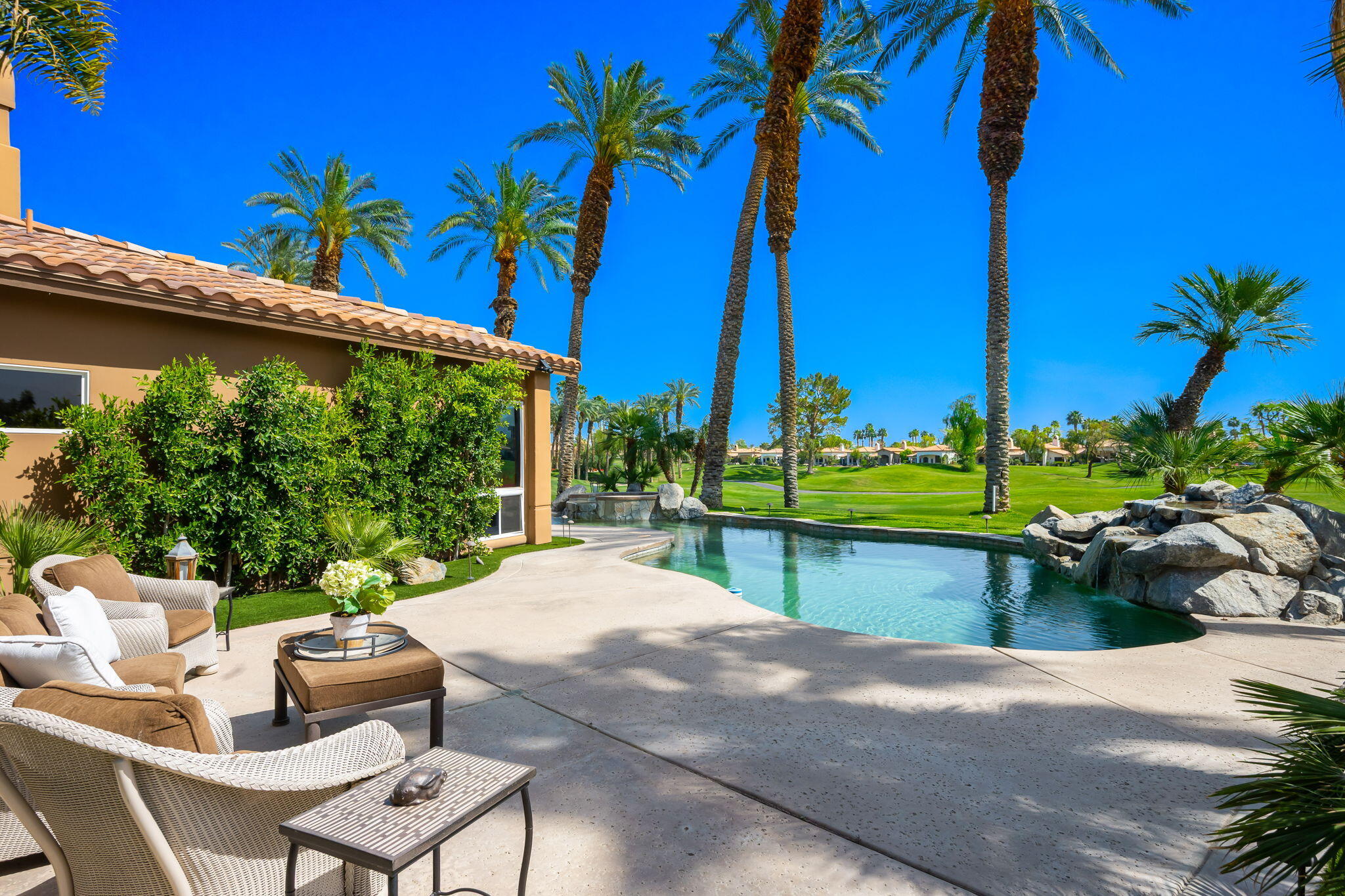 78815 Vía Carmel La Quinta, CA 92253 - Photo 69 of 74 a view of a swimming pool with a lounge chairs
