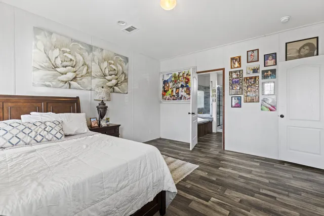 a balcony with furniture and wooden floor