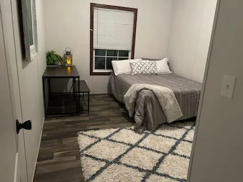 a view of a house with basketball court