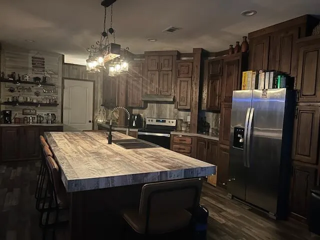 a bedroom with two beds and a large window with outer view