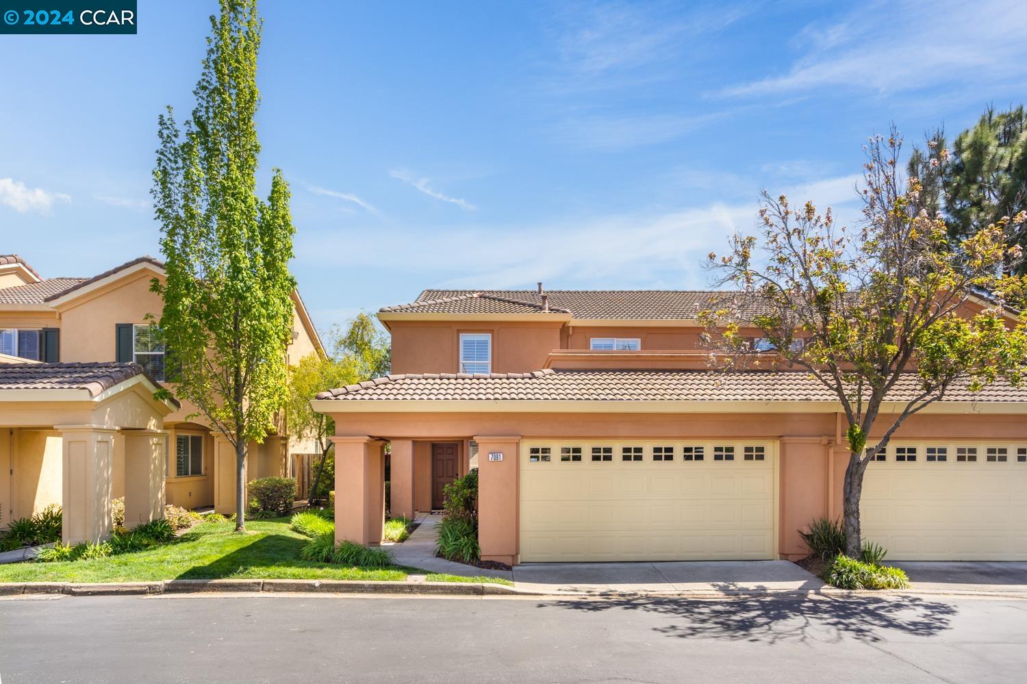 7091 Briza Loop San Ramon, CA 94582 - Photo 1 of 1 a building with trees in front of it