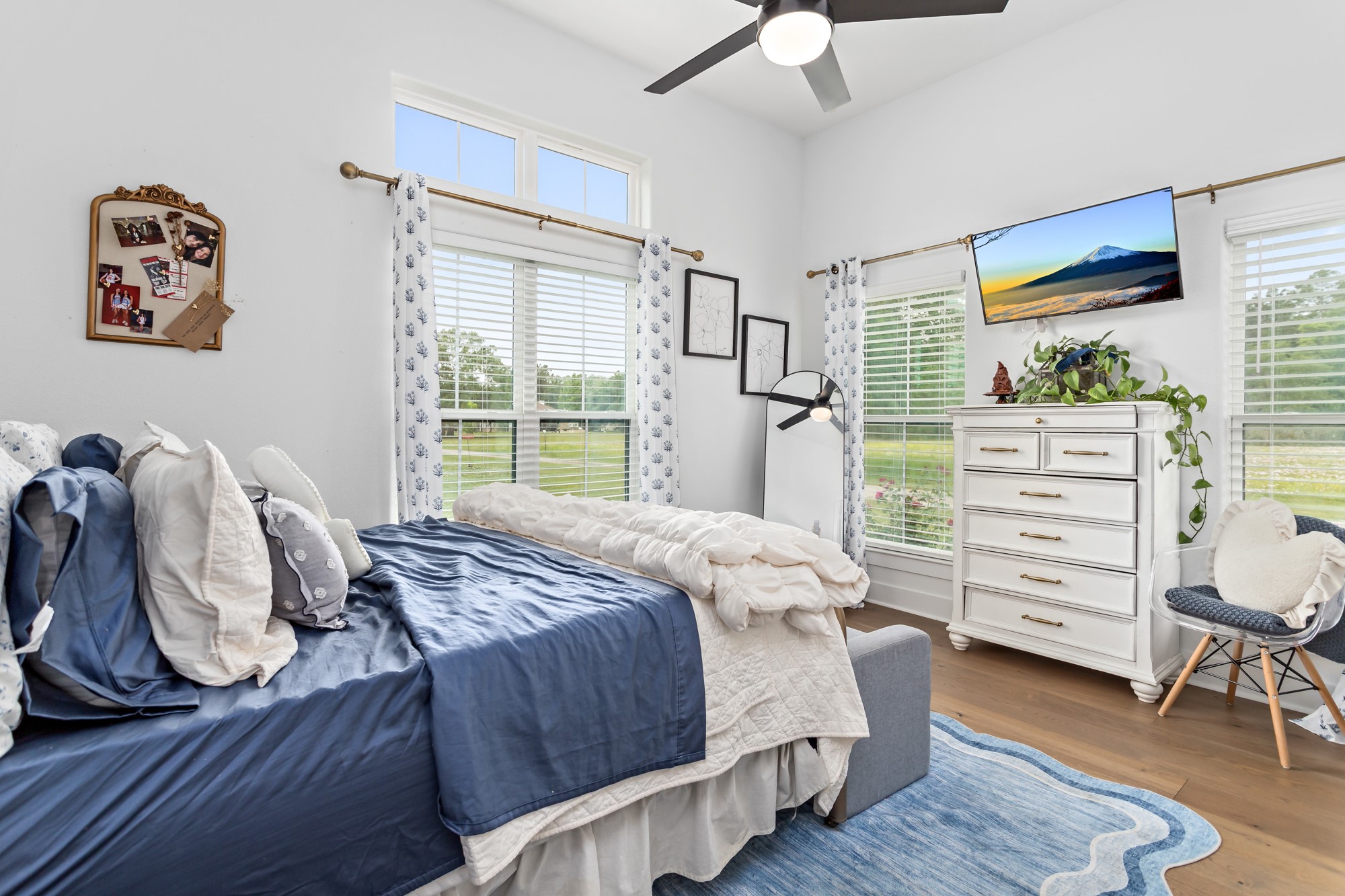 10573 Cooks Lake Road Lumberton, TX 77657 - Photo 22 of 47 a bedroom with a bed and a window