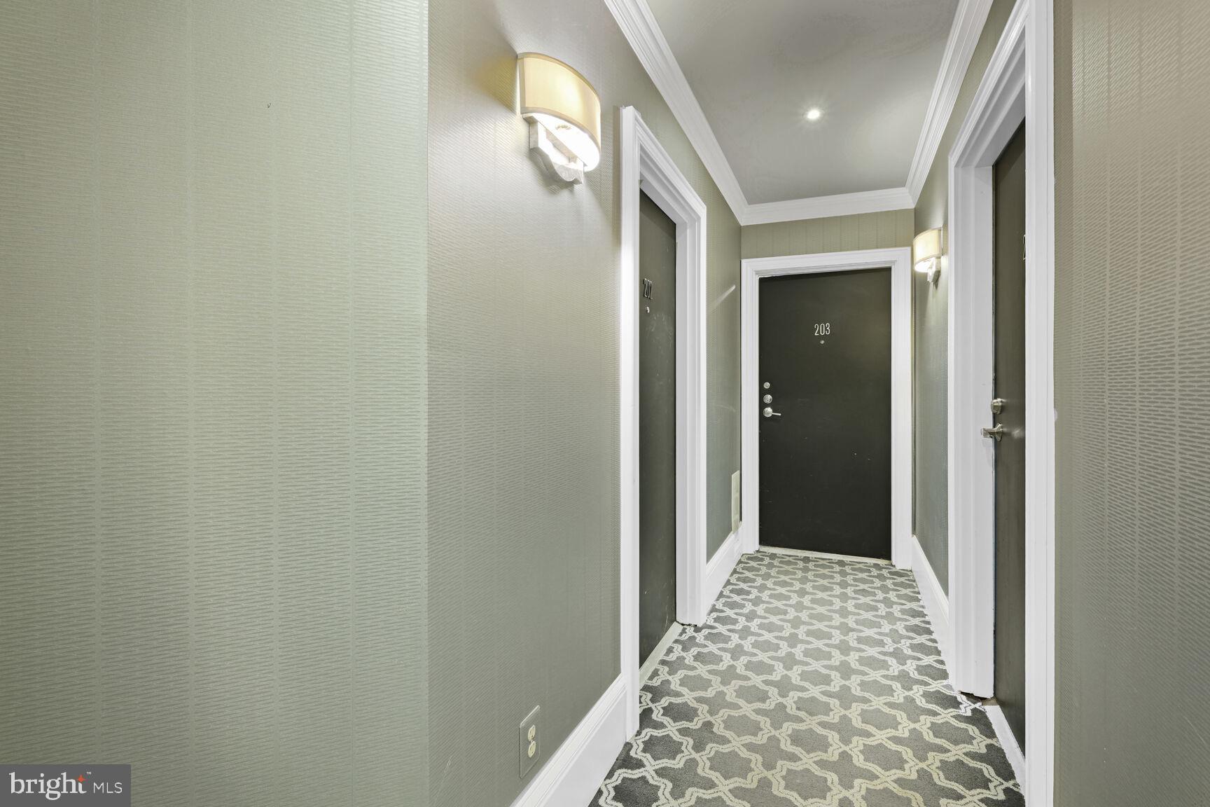 2001 16th Street Northwest, Unit 203 Washington, DC 20009 - Photo 13 of 15 a view of hallway with wooden floor