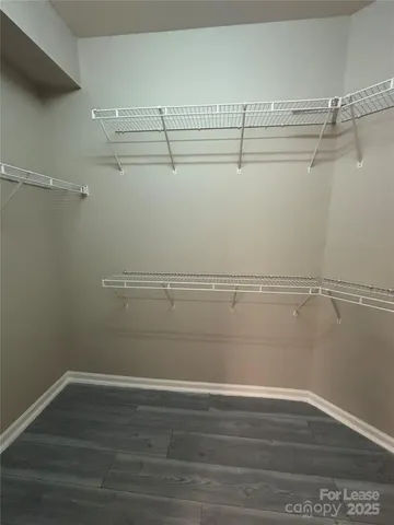 a view of a room with racks on the wall