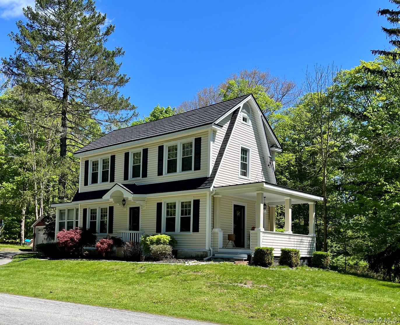 145 Drake Road Pleasant Valley, NY 12569 - Photo 1 of 47 a front view of house with yard and green space