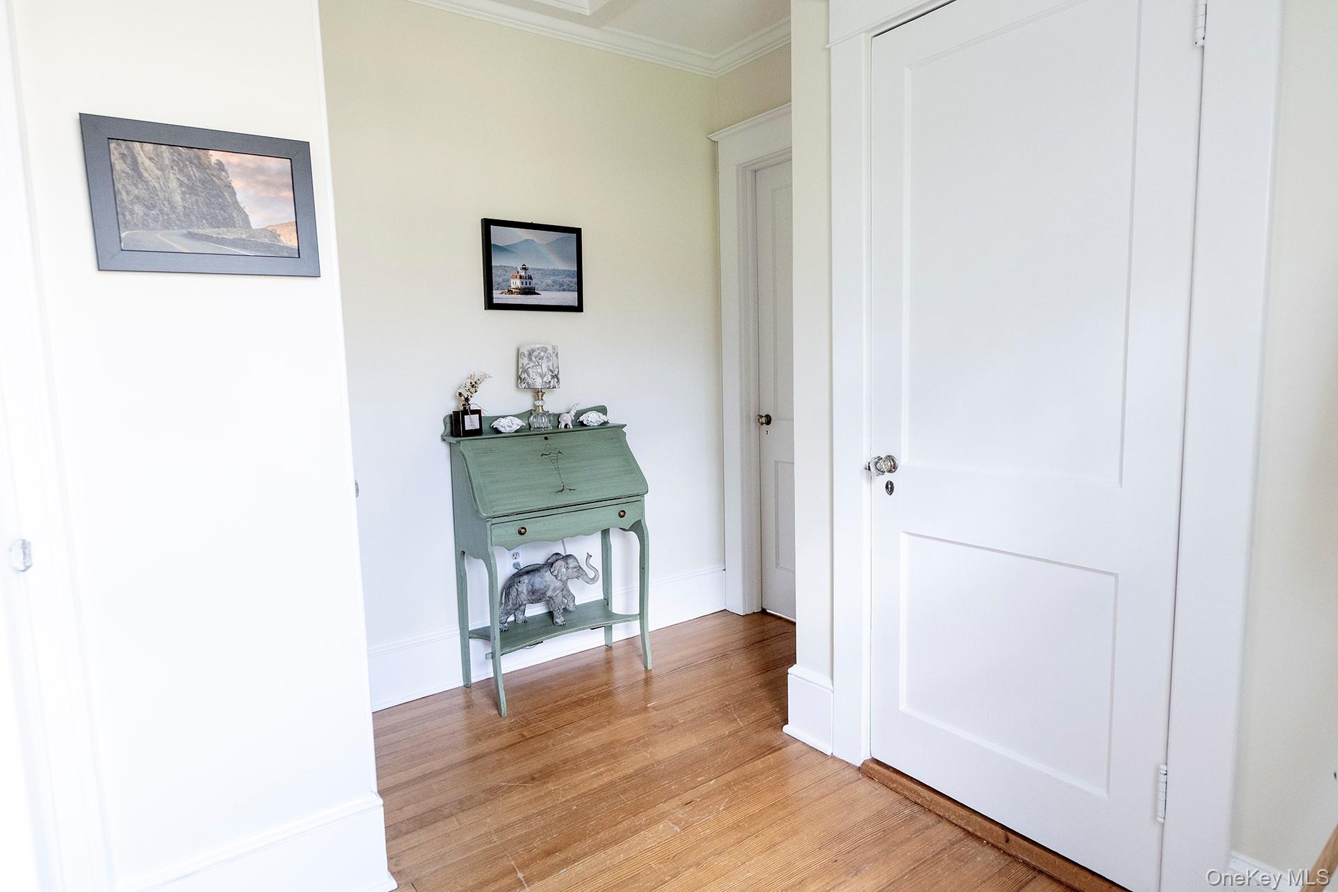 145 Drake Road Pleasant Valley, NY 12569 - Photo 15 of 47 a hallway with a bench and a mirror next to door