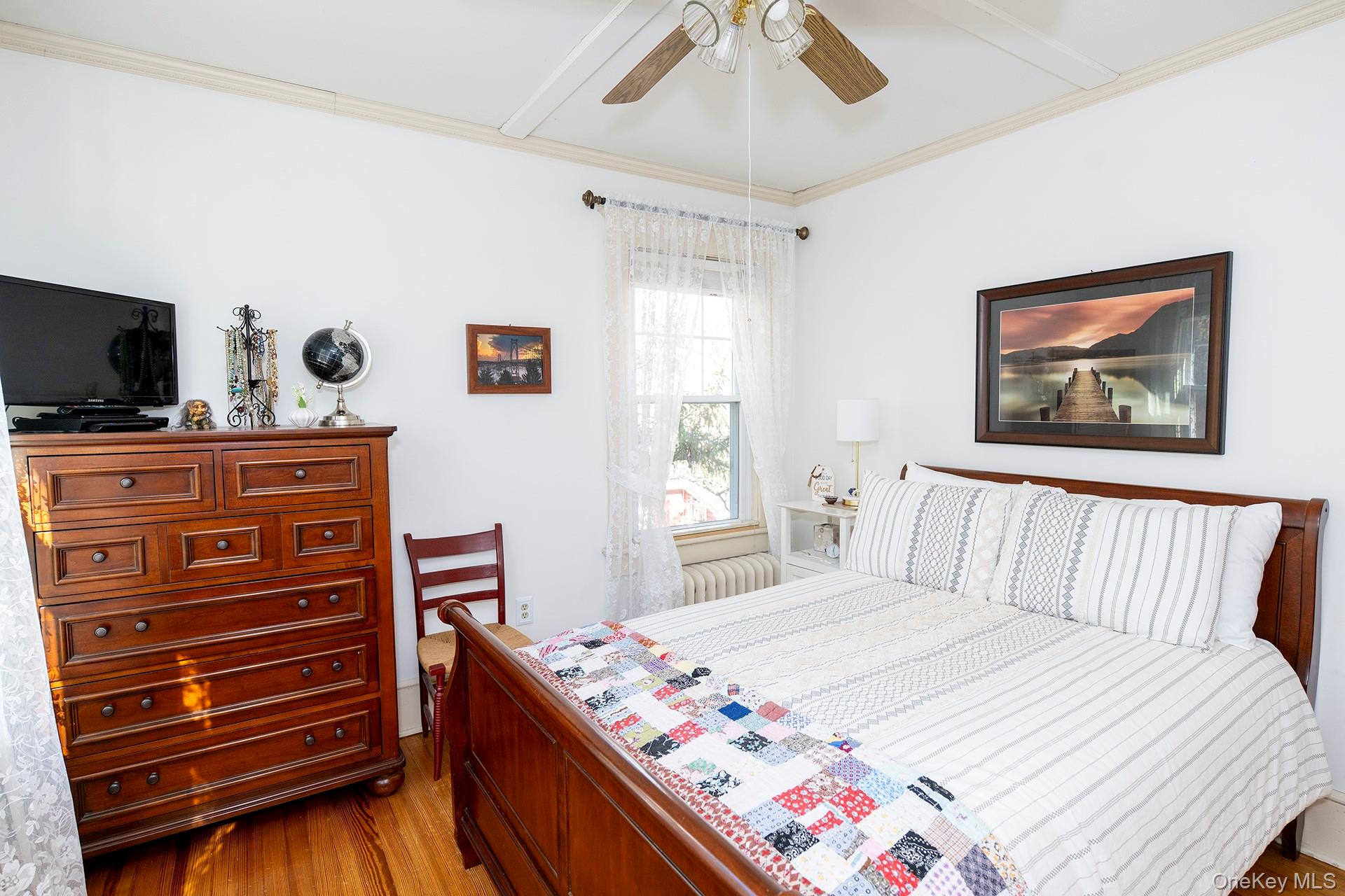 145 Drake Road Pleasant Valley, NY 12569 - Photo 17 of 47 a bedroom with a bed and a flat screen tv