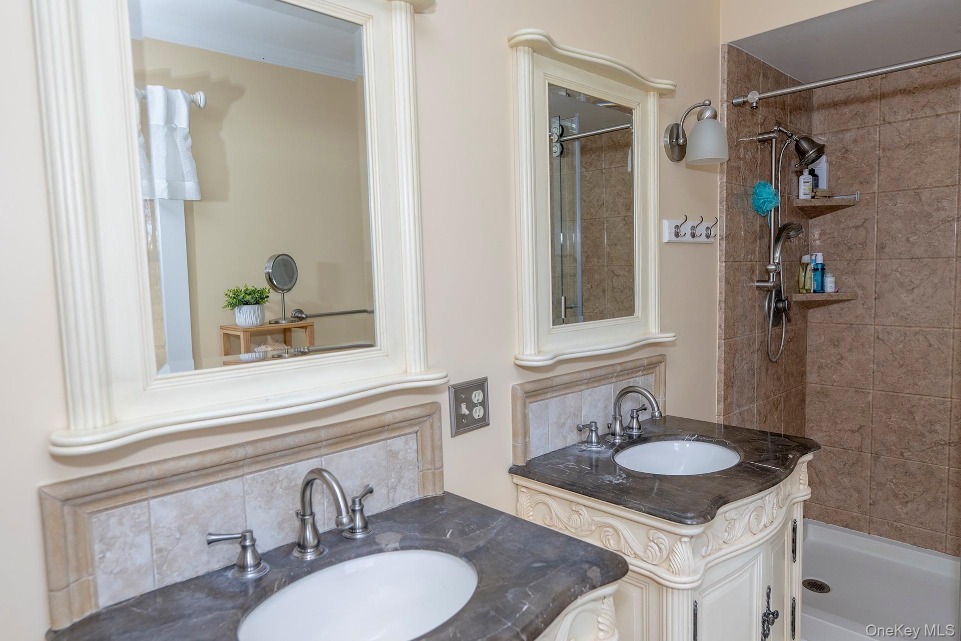 145 Drake Road Pleasant Valley, NY 12569 - Photo 19 of 47 a bathroom with a granite countertop sink and a mirror