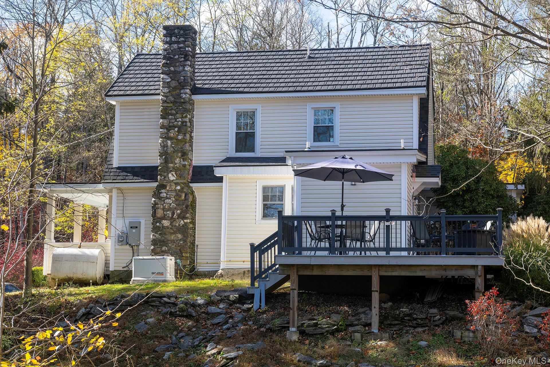 145 Drake Road Pleasant Valley, NY 12569 - Photo 25 of 47 a view of a house with backyard and sitting area